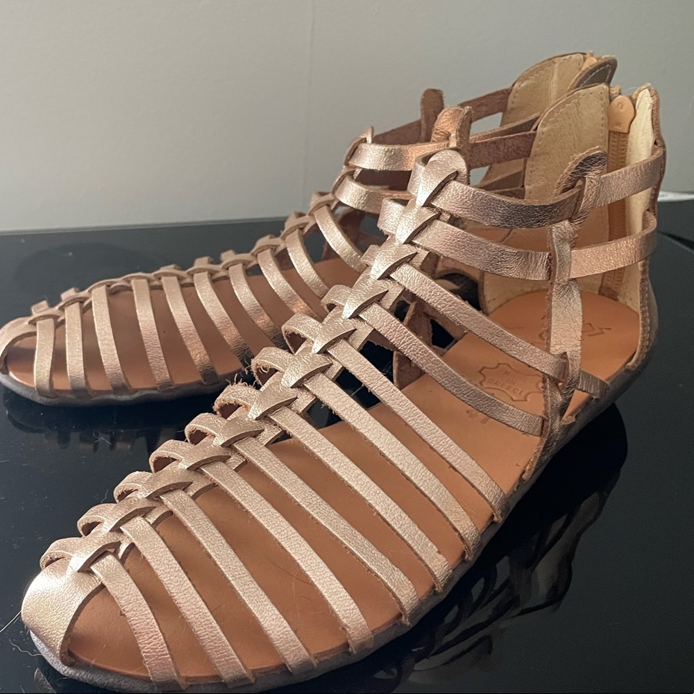 Rose gold gladiator sandals. Genuine leather. New, never worn. Size 9.